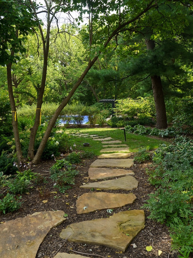 Maintaining an outdoor garden to boost property value in Kansas City