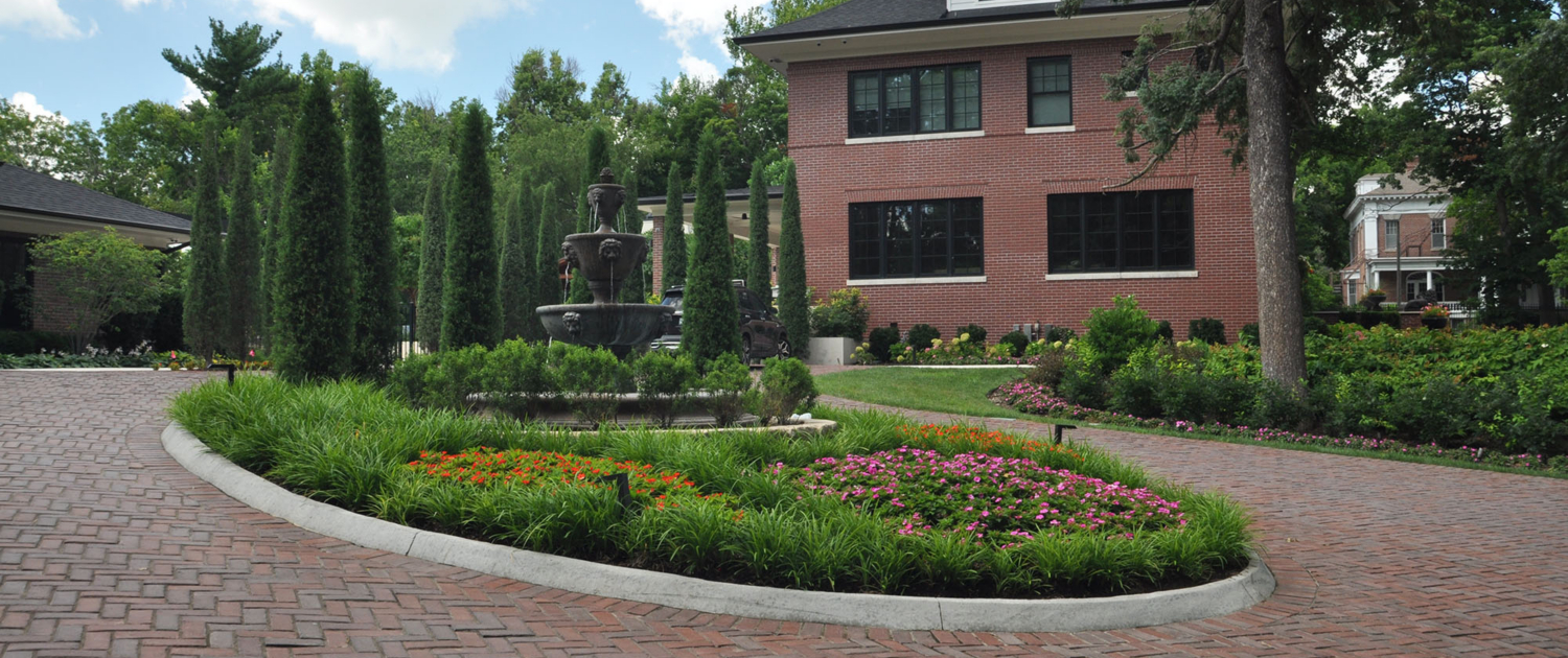 Estate Habbiger Driveway And Landscaping Next To Home