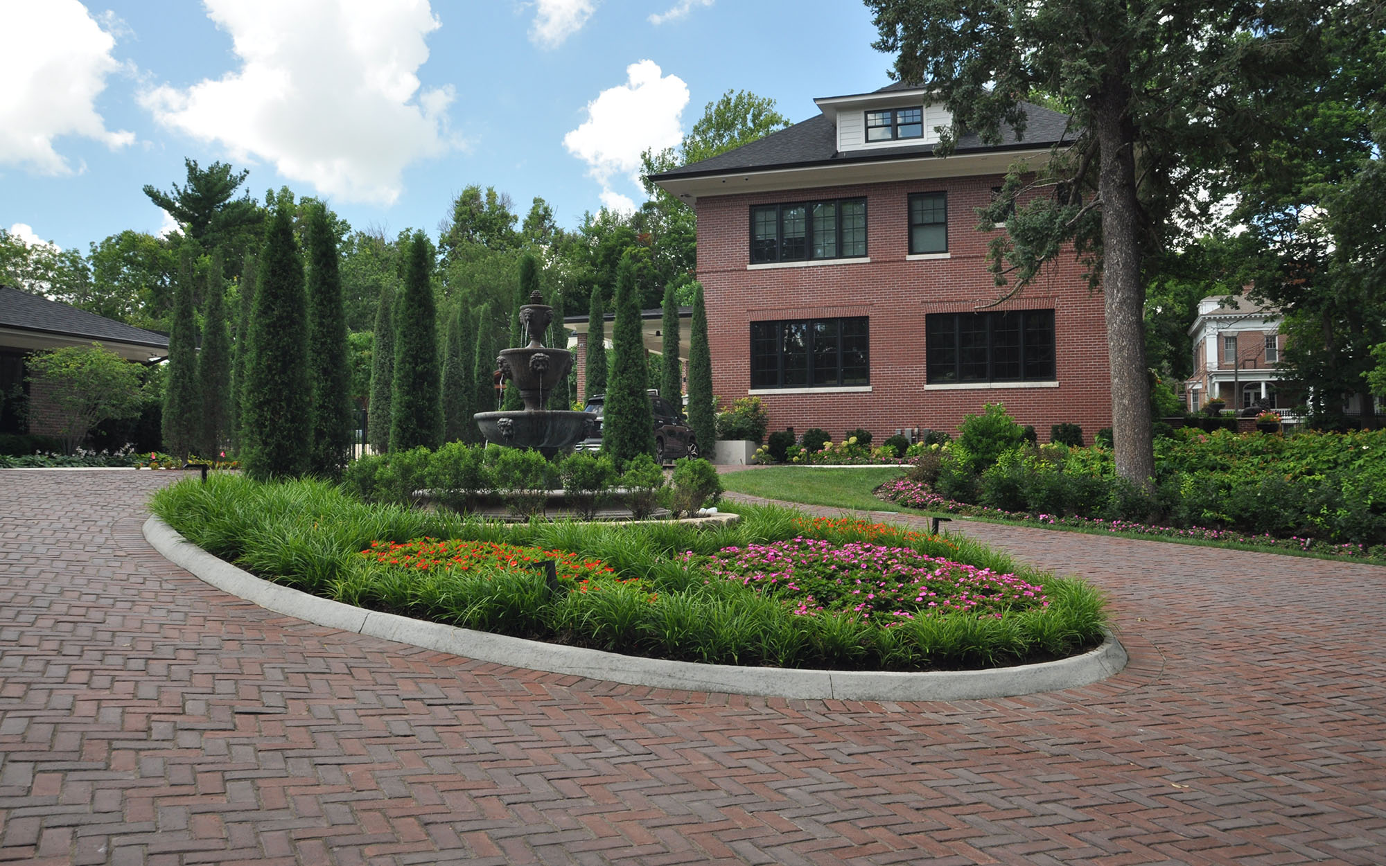 Estate Habbiger Driveway And Landscaping Next To Home