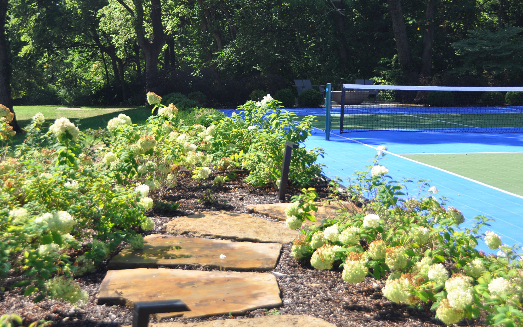 Estate Habbiger Paver Path Next To Pickleball Court